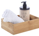 opbevaringskasse i bambus fra Day med et håndklæde og sæbe i