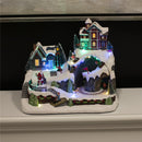 Juleby "Mountain Town" med lys og musik. Til batteri