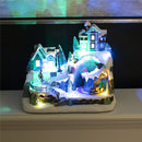 Juleby "Mountain Town" med lys og musik. Til batteri