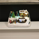 Juleby "Treehouse Town" med lys og musik. Til batteri