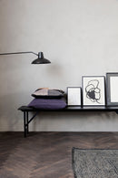 En pude på en bænk er betrukket med additional pudebetrækket fra House Doctor  